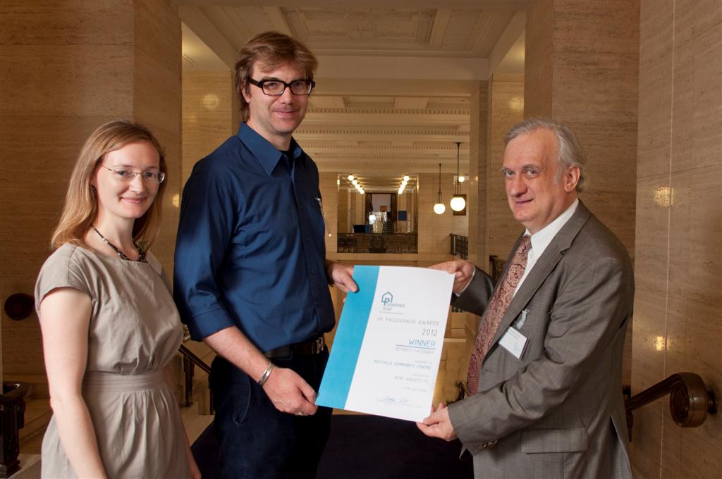 Sarah Lewis, Christian Senkpiel accepting Mayville certificate on behalf of Bere Architects from Dr Wolfgang Feist.jpg Sarah Lewis, Christian Senkpiel accepting Mayville certificate on behalf of Bere Architects from Dr Wolfgang Feist.jpg